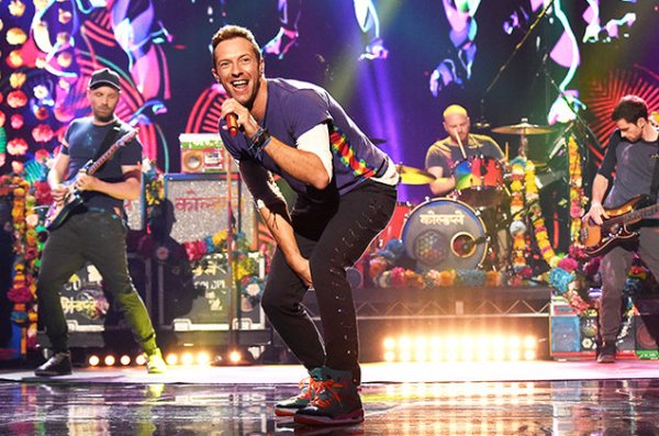  Chris Martin performs on stage with his Grammy award winning band Coldplay. Martin recently released his a hit song along with The Chainsmokers entitled Something Just Like This.