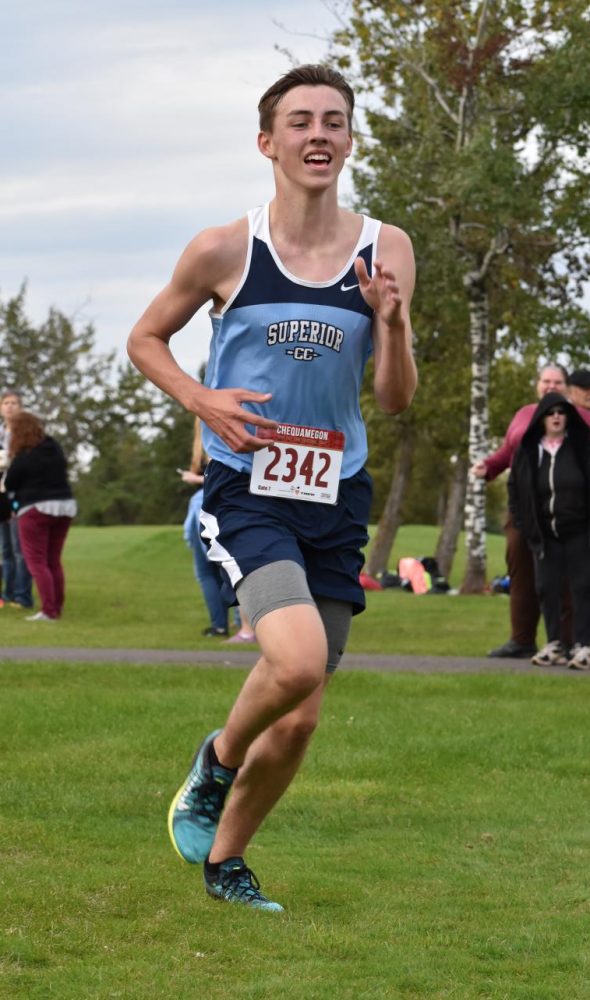 Junior Luke Denninger finishes his race at Nemadji Golf Course on Sept. 7, with a time of 19:55, placing 4th on his team.