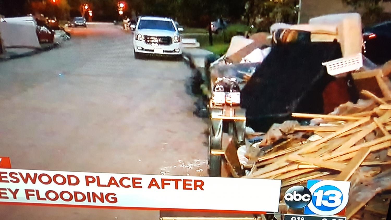 In the late days August and early days September, Hurricane Harvey lingered over Houston, Texas, leaving houses destroyed and families displaced. The photo above is a screenshot of a news report showing debris being removed from senior Rufina Robbins cousins house in Houston. 