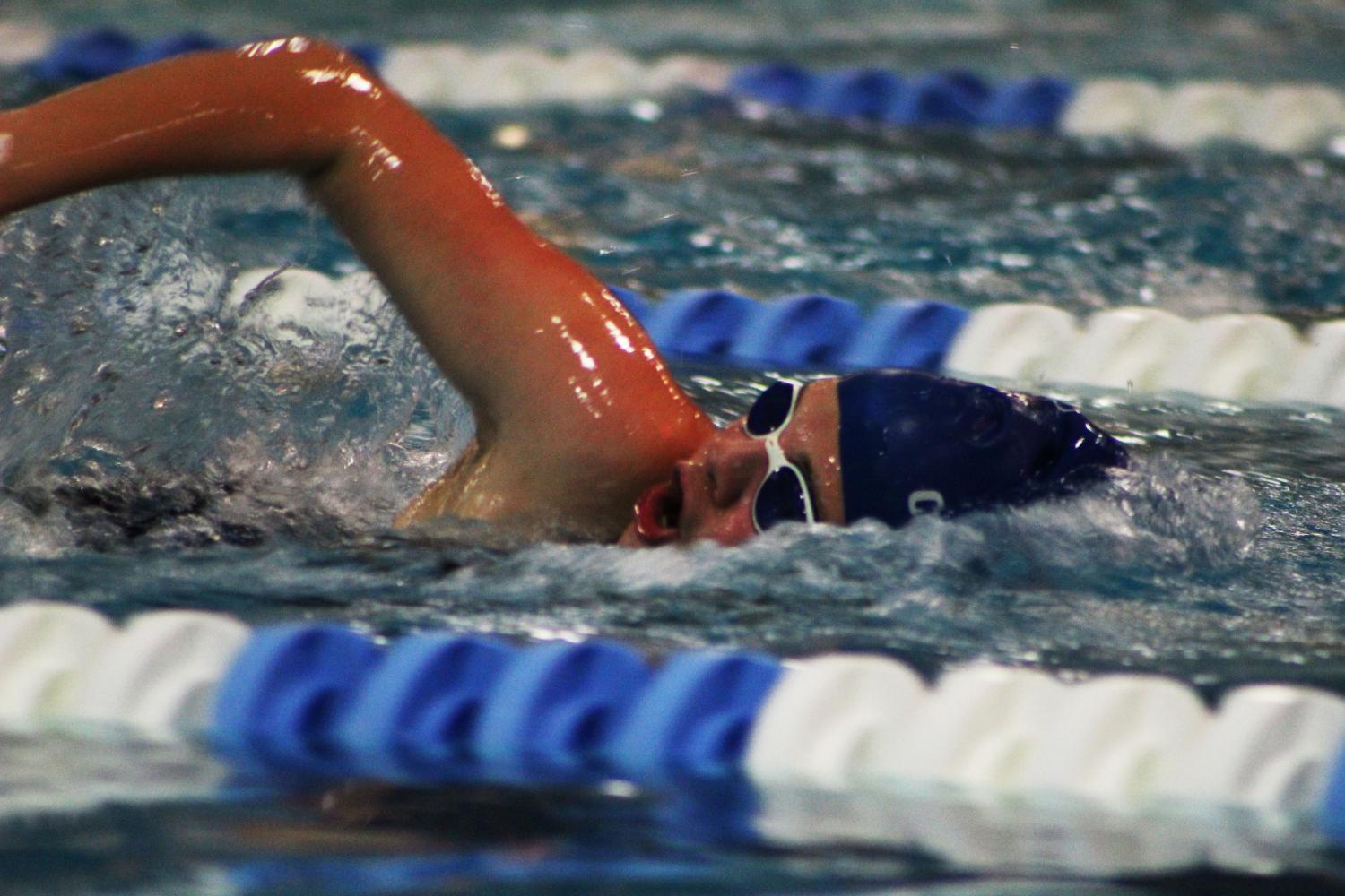 Sophomore Jessica Cunningham swims the 100-freestyle at the swim meet on Tuesday.
