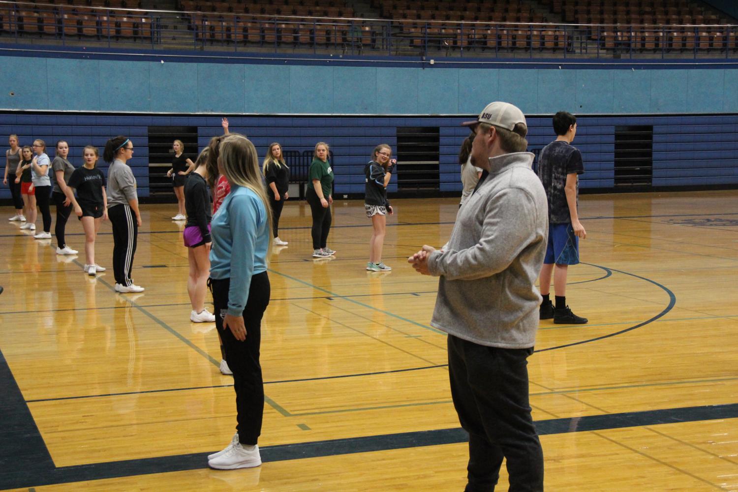 Upcoming cheerleaders practice their skills last Thursday.