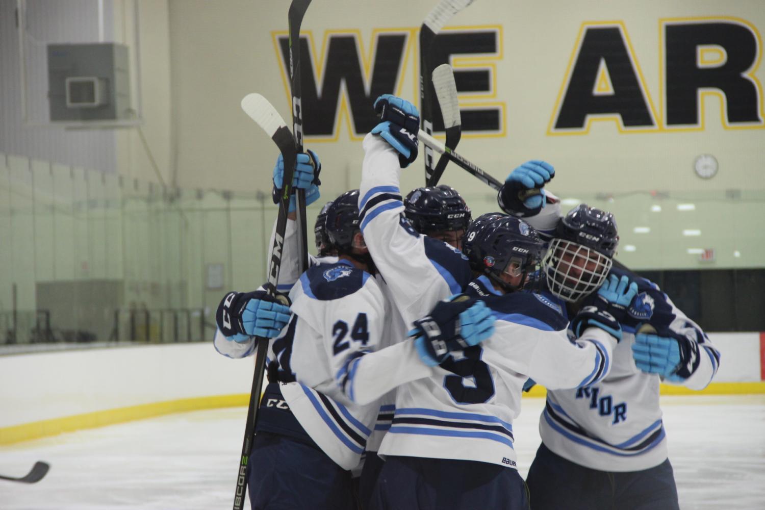 Starting Spartans celebrate their 2nd goal of the game