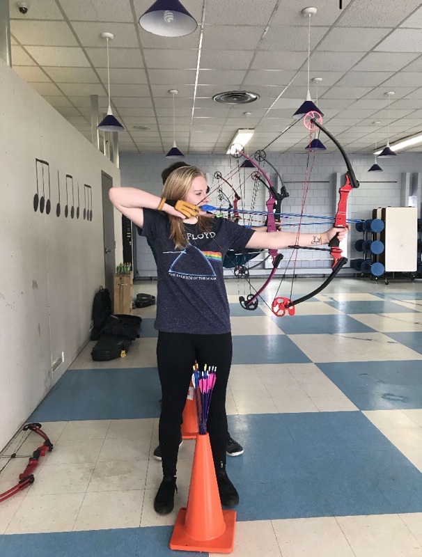 Senior Tailyn Bennett practices for nationals on Thursday, April 12 in the cafeteria. 
