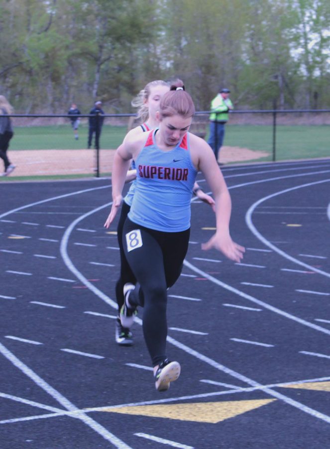 Sophomore Cammi Vandenberg runs towards the finish line on Monday at the NBC Complex. The girls 4x400 will advance to sectionals. 
