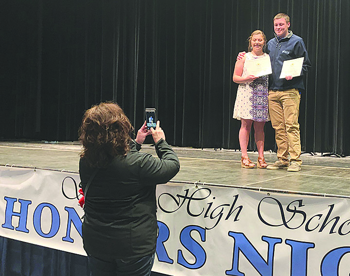 Seniors Sarah Cannon and Hunter Summers pos for a photo after Honors Night on Wednesday, May 30. 
