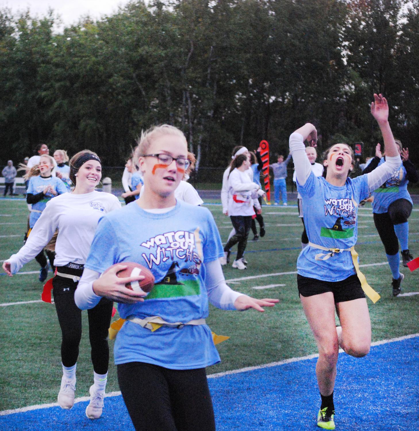 Senior Erin Walpole scores touchdown against Sophomore team in Powderpuff game on Wednesday, Oct. 3.