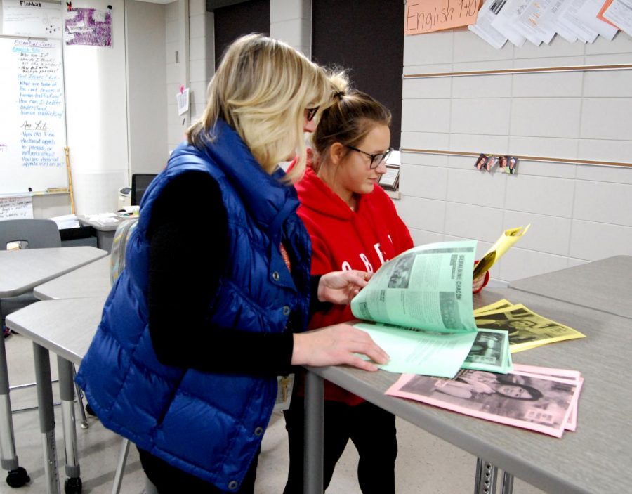 Amnesty International Teacher Advisor Mary Anderson-Petroske (left) and Sophomore Maya Sickler (right) looking at possible cases for the next Write for Rights campaign on Nov. 16 in room 1590. 