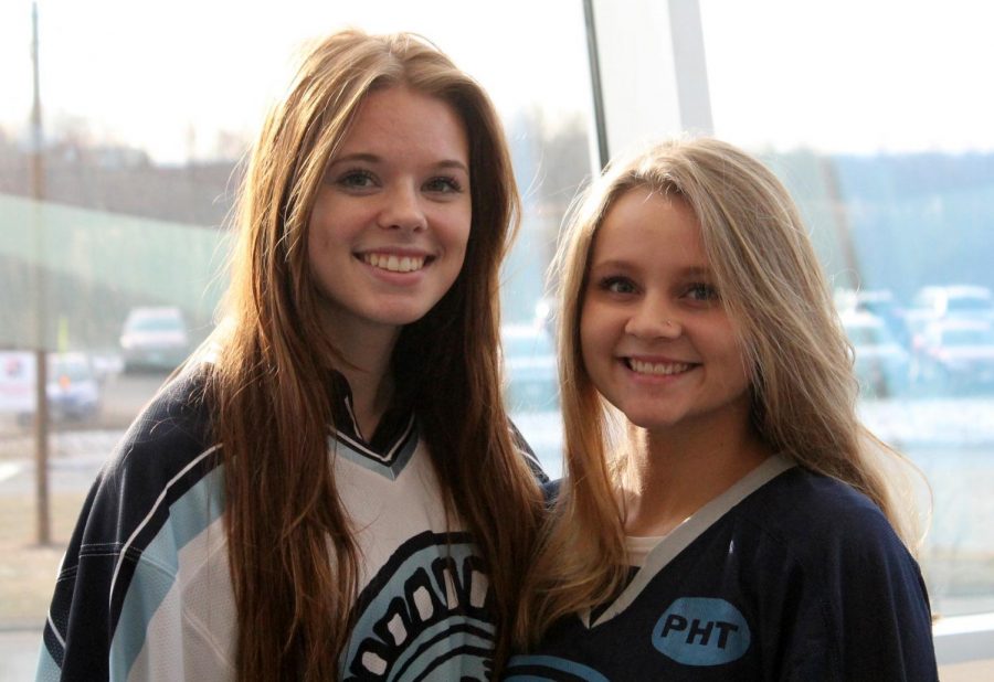 Seniors Karlee Hudacek and Kylee Durfee posing on the second floor on Tues Dec 18. 