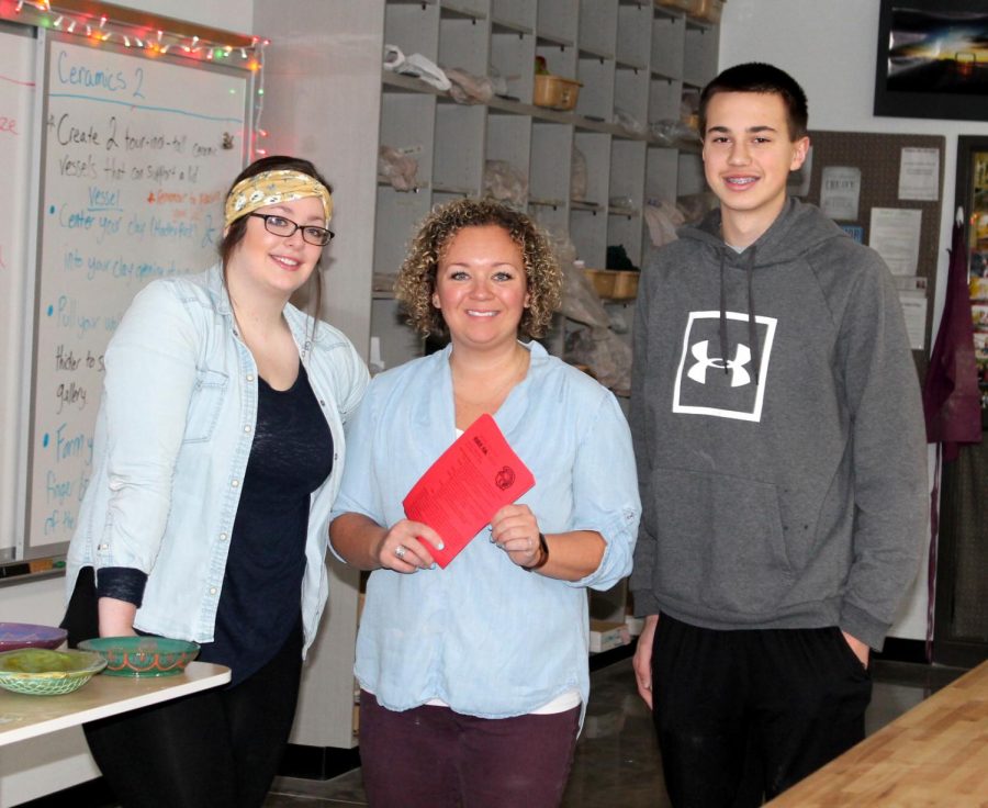 Sophomore Student Council representative Mara McGillis, stands with Student Council advisor, Nikkee Francisco and sophomore Isaac Domitrovich in the Ceramics room on Dec 12. McGillis and Domitrovich along with Francisco are working on putting on Bring on the Break which will be held the week of Dec 21.