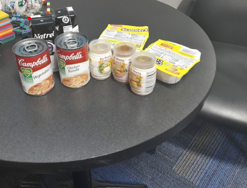 Food displayed by Nicky Wilson, Family Services Program Coordinator, in SHS counselor Wendy Nelson’s office before being distributed to students on Dec. 20.