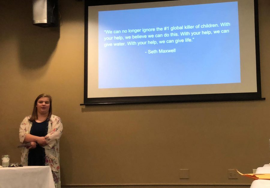 Dezaray Haberling presenting her senior project, raising funds for the Thirst Project, to the Superior Optimist Club at their weekly meeting on April 17.