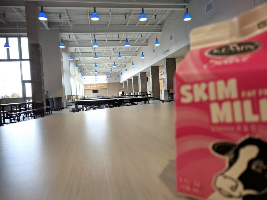 An empty milk carton rests atop a table in the Spartan Commons on April 5.
