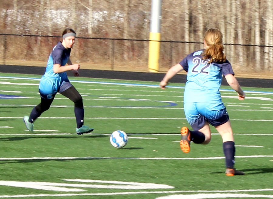 Senior Amelia Evavold (left) moves the ball up the field in a game earlier this season while freshman Lily Walrath (22) gets into position. Superior beat Chippewa Falls 4-1 at the NBC Spartan Sports Complex May 25 in the first round of the Wisconsin Interscholastic Athletic Association playoffs, and will play Kimberly tonight in Wausau at 5 p.m.