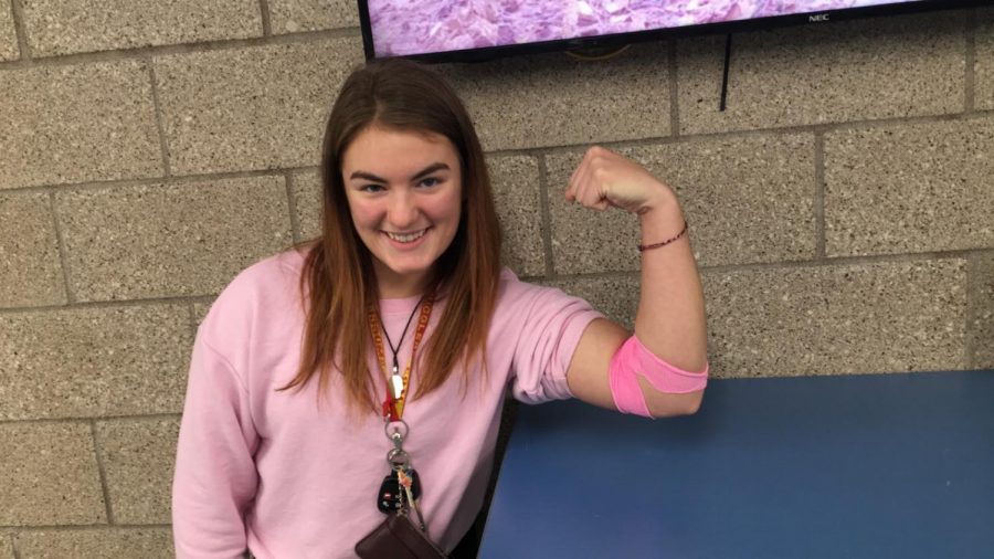 Senior Cammi Vandenberg flexes after giving blood at the Blood Drive on Oct. 2 in the NBC Spartan Sports Complex. The drive ends at 2:30 pm today. 