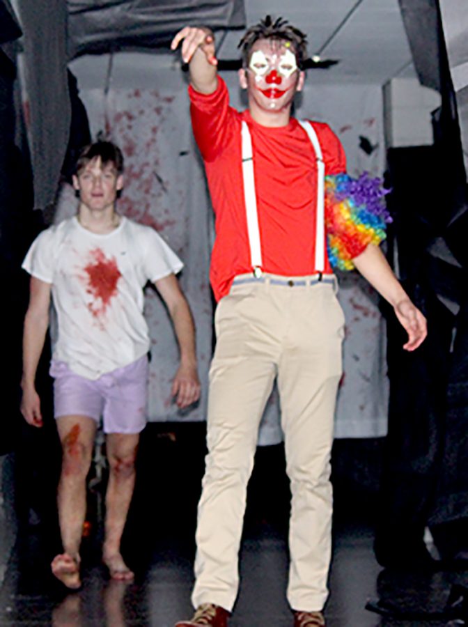 Seniors Gunnar Hansen and Noah Lear look on after scaring students out of the Haunted Hallway Wednesday night, Oct. 30. 