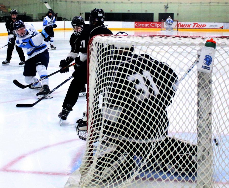 Senior Gunnar Hansen (9) follows through on a shot during his second-period goal. This is Hansen’s sixth goal in six games on the season.

