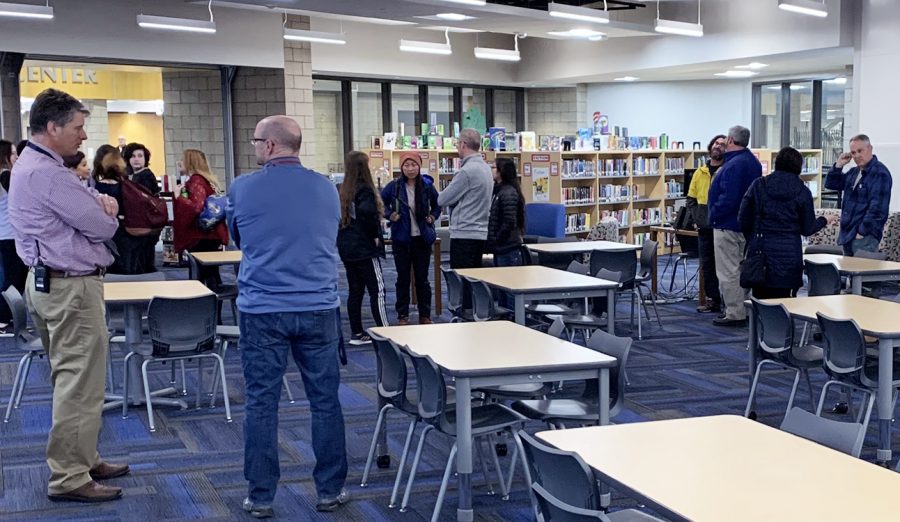 Families and administrators discuss matters after a 5:30 p.m. meeting in the library March 11. Administrators announced the cancellation of the Spanish students’ trip to Costa Rica just hours after the Coronavirus had been declared a pandemic by the World Health Organization.