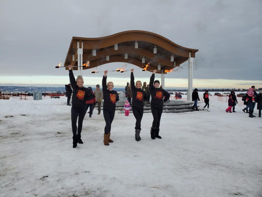 Fire twirlers from Sterling Silver Studio providing entertainment to festival goers on January 24, 2020.