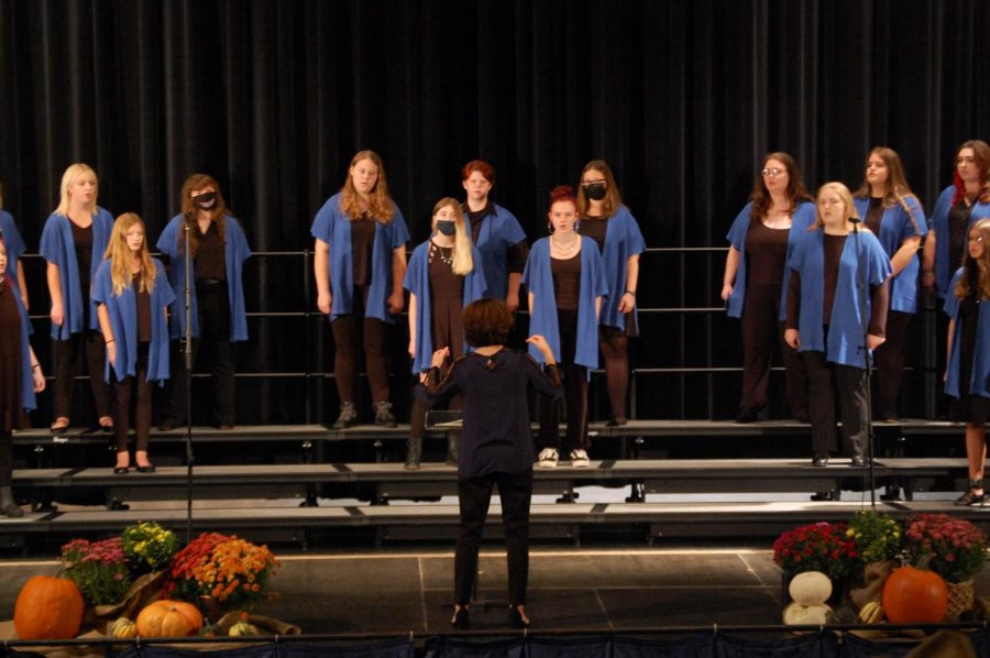 Choir Director Jennifer Robbins leads the Concert Choir during their Fall performance on October 14 in the SHS Performing Arts Center. Four different choirs performed at the event.