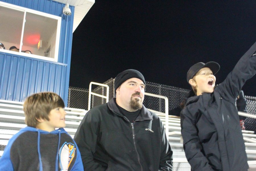 Director Of Transportation David See attends the football game with his son, Caden Peterson, and his friend Oliver Murphy Oct 21. 