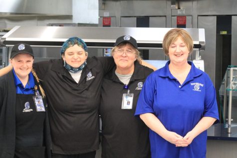 Jessica Simonson, Monica Frickart, Laurie Buttrick and Betty Nordrum pose in the Spartan Cafe on March 21 for National Womans Month.