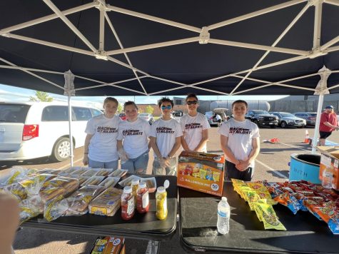 DECA members volunteer at the food stand Sept. 2nd at the NBC Spartan Sports Complex during Tailgate