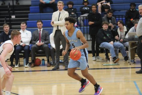 Junior Tresean Sangiar dribbling the ball down the court on Dec. 9, 2022. 