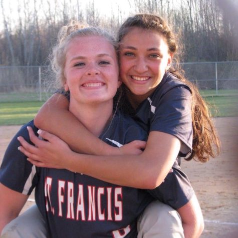 Bobbijean Miller and Amanda Kishish posing for a picture after one of their high school games.