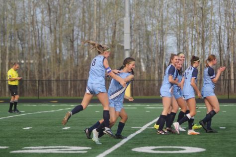 Junior Nora Wells and Senior Presley Kalin jump in excitement after Kalin scores a goal against the Hayward Hurricanes at the NBC Spartan Sports Complex on May 15, 2023. Kalin is among three seniors on the team and was excited to solidify a point during the senior night game. 