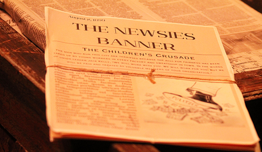  Prop newspaper sits at the ready before the “Newsies” show begins May 13.