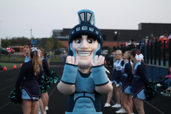 Sparty poses with cheerleaders on the track at Superior High Schools ‘Tackle Cancer’ football game. Sept. 8, 2023.
