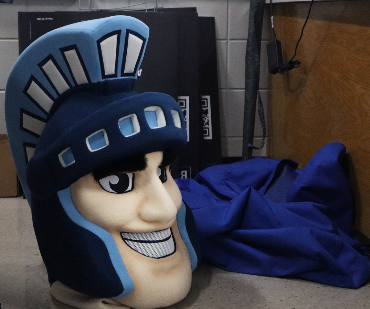 Sparty the mascot’s head sits vacant next to the costume bag in the Athletic Office Nov. 16, 2023 
