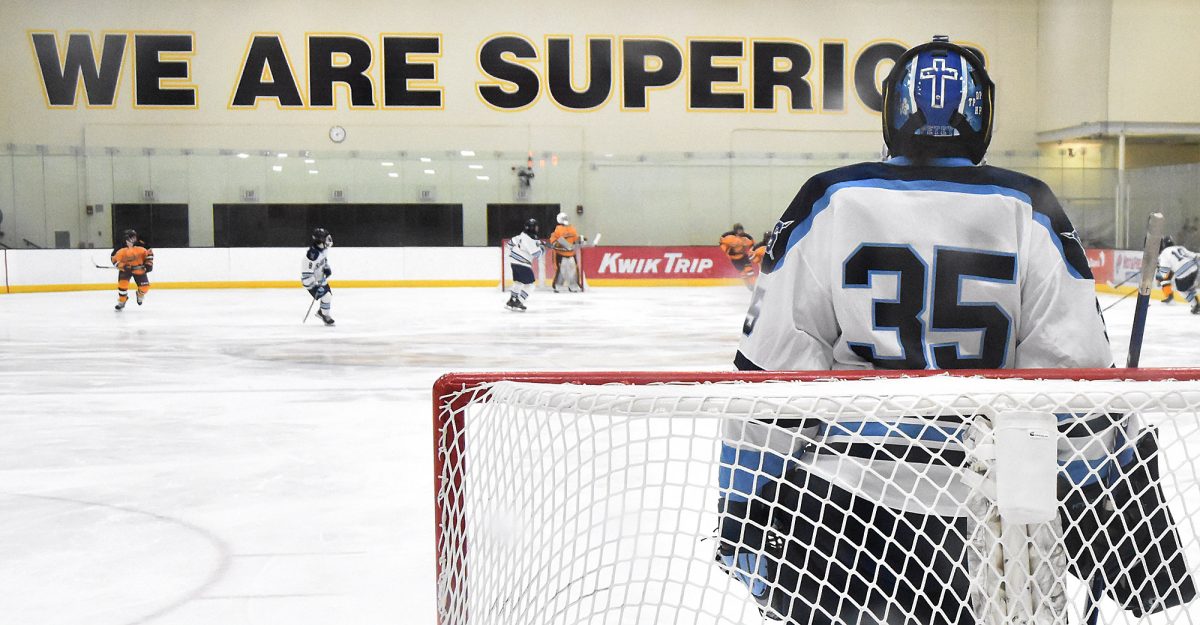 Senior Trent Peterson stands in the goal during the 1st period on Dec. 14, 2023 at Superior. 