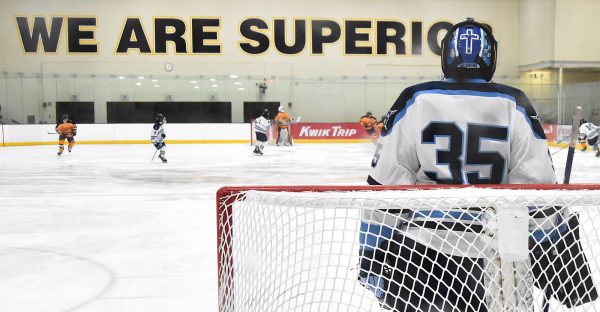Senior Trent Peterson stands in the goal during the 1st period on Dec. 14, 2023 at Superior. 