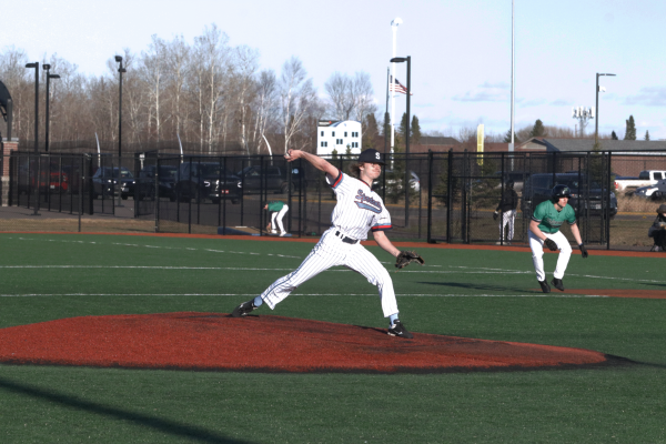 Senior Pitcher Mason Larson throws a pitch in the sixth inning on Friday April 12.