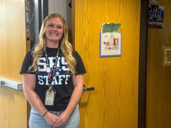 Bobbijean Gidley poses happily outside her classroom on May 1o.
Gidley is a Friendly face in the hallway at SHS

