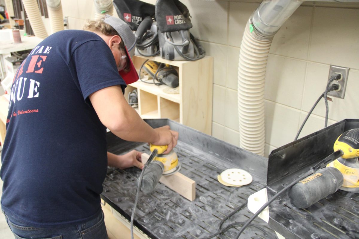 Gabriel Killian builds a table for his final project in woodworking. Students were given multiple options on what to build for their final project and Killian chose the table.