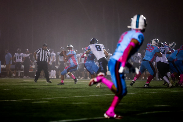 Sophomore Carson Smith (#10) throws the ball to junior Liam Flores (#8) for a deep reception on Sept. 13 at the NBC sports complex.