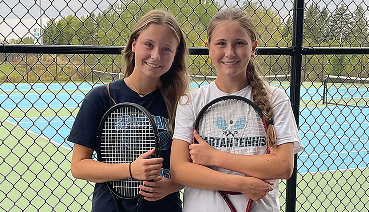 Senior Greta Clark (left), and sophomore Lily Clark pose at the NBC Sports Complex tennis courts on Sept. 30.