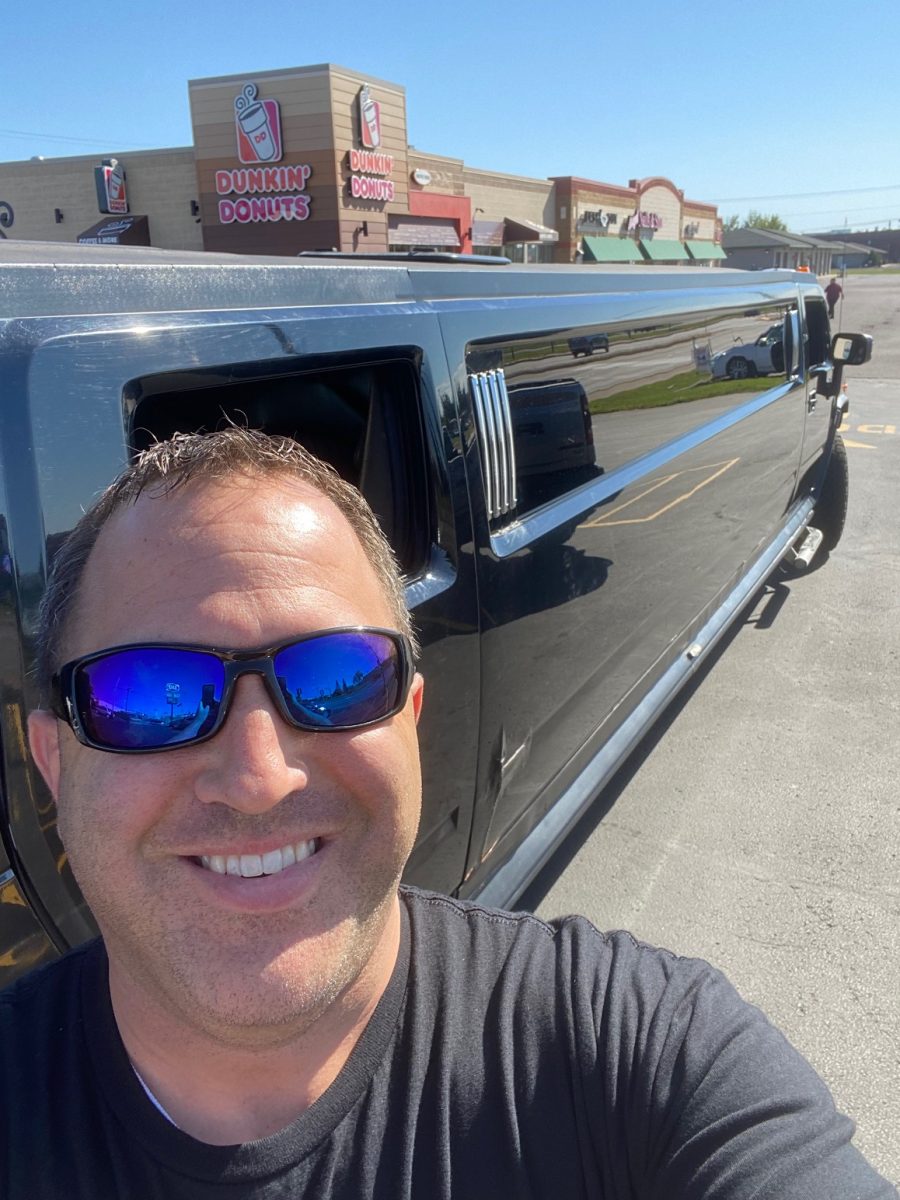 Brent Hipp snaps a quick picture Sept. 30, 2022 in front of Superior Dairy Queen. 

