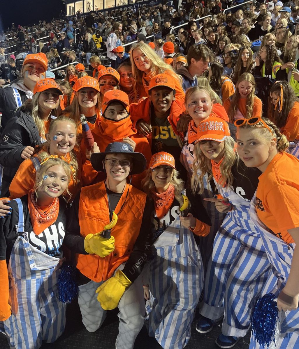 Photo Submitted by Natalie Schultz Seniors in the student section pose for a picture at halftime of the Homecoming football game on Oct.4 at the Spartan Sports Complex