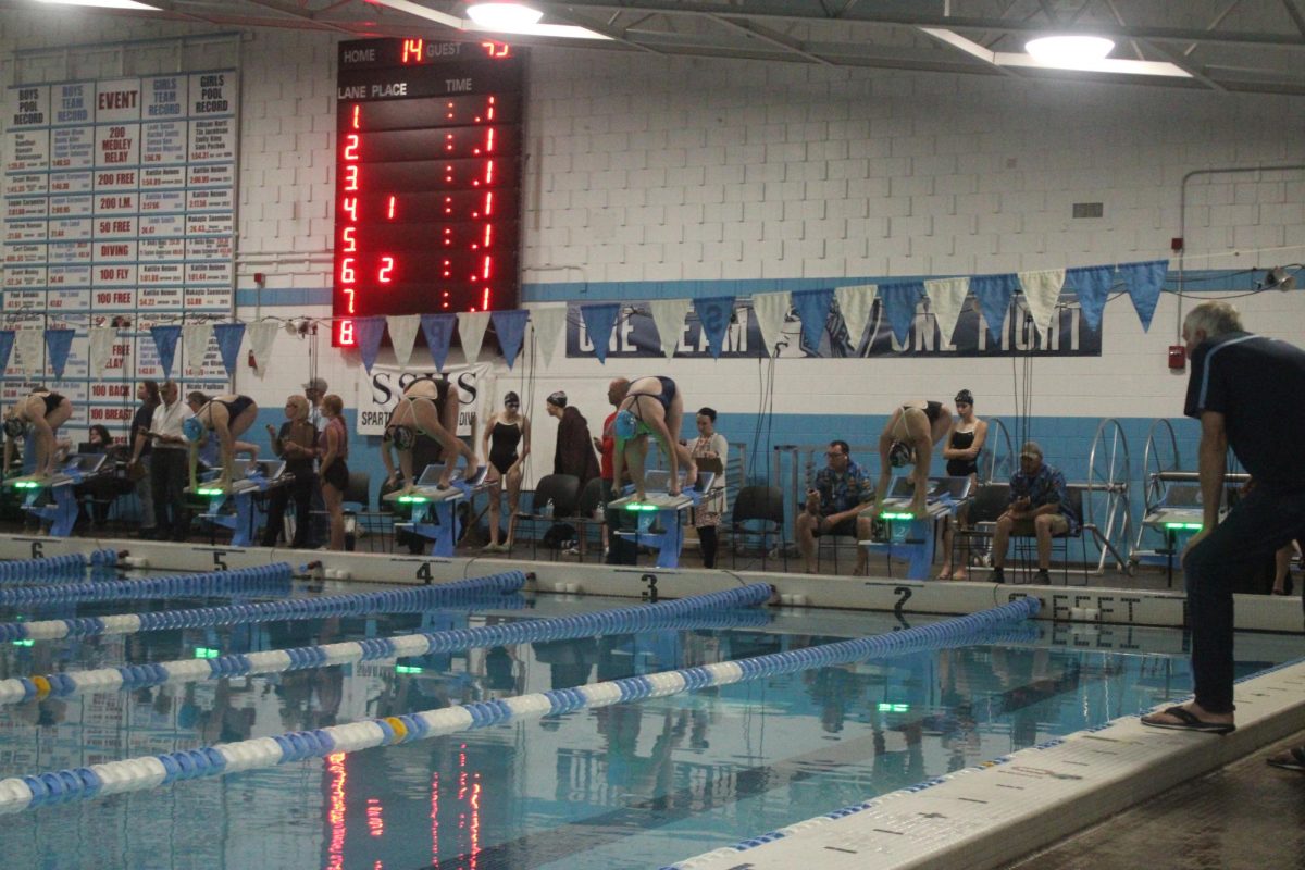 Spartan swimmers prepare for race to begin at the home meet on Oct. 3.
