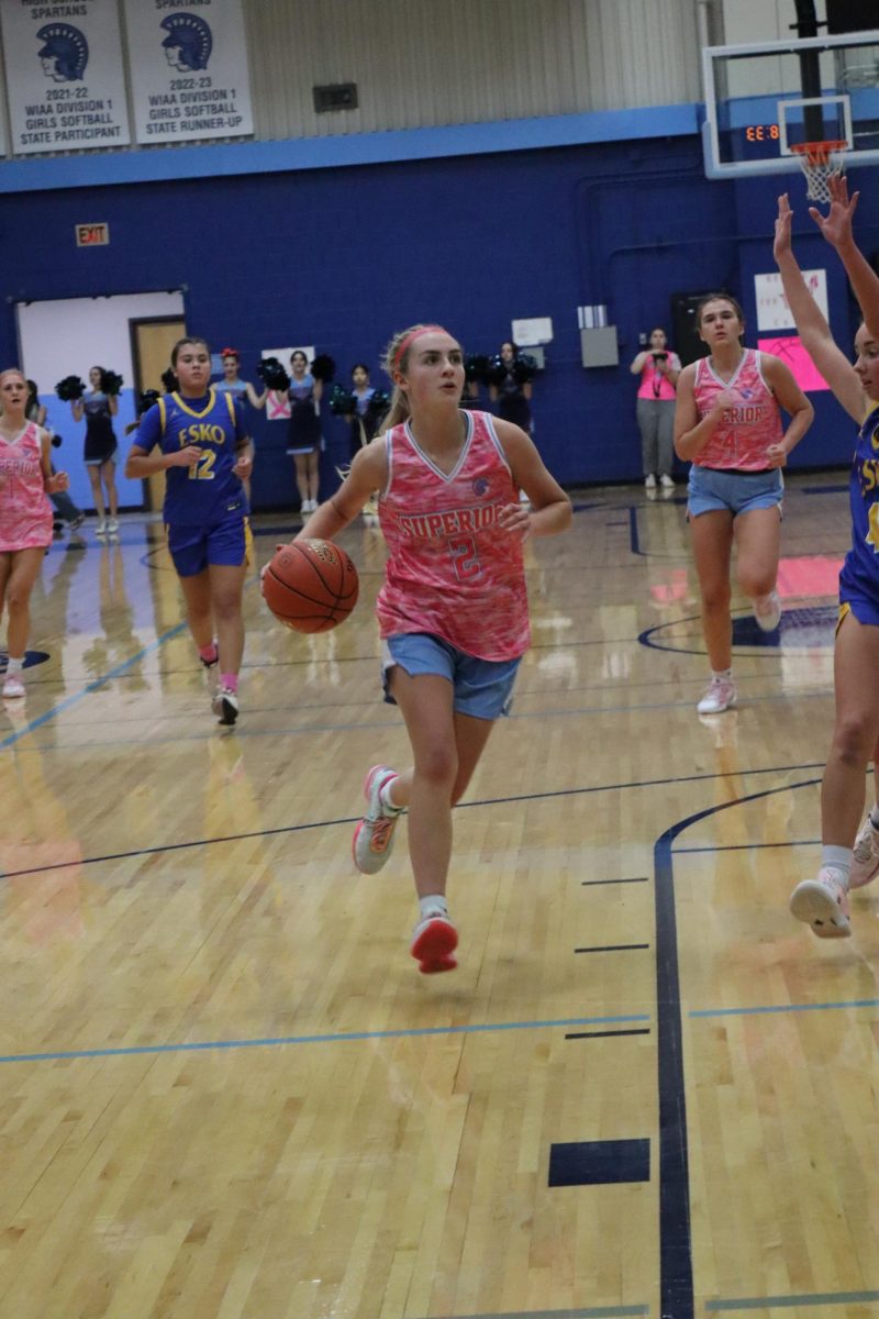  Senior guard Annabel Manion dribbles up the court for a layup on Dec. 2, 2024 in the Spartan Arena.