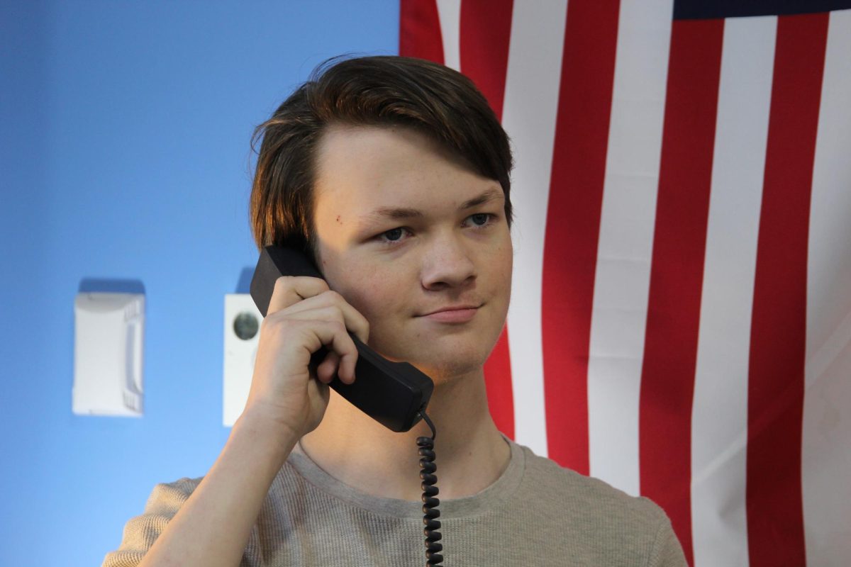 Dillon Blix poses for a photo on Jan. 8 of him performing the pledge of allegiance in the Spartan Spin room.