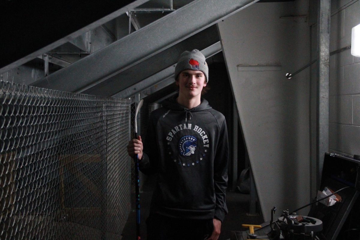 Freshman hockey player Tucker Tepsa stands in the player tunnel at Marathon Park Ice Arena on Feb. 20, 2025.
