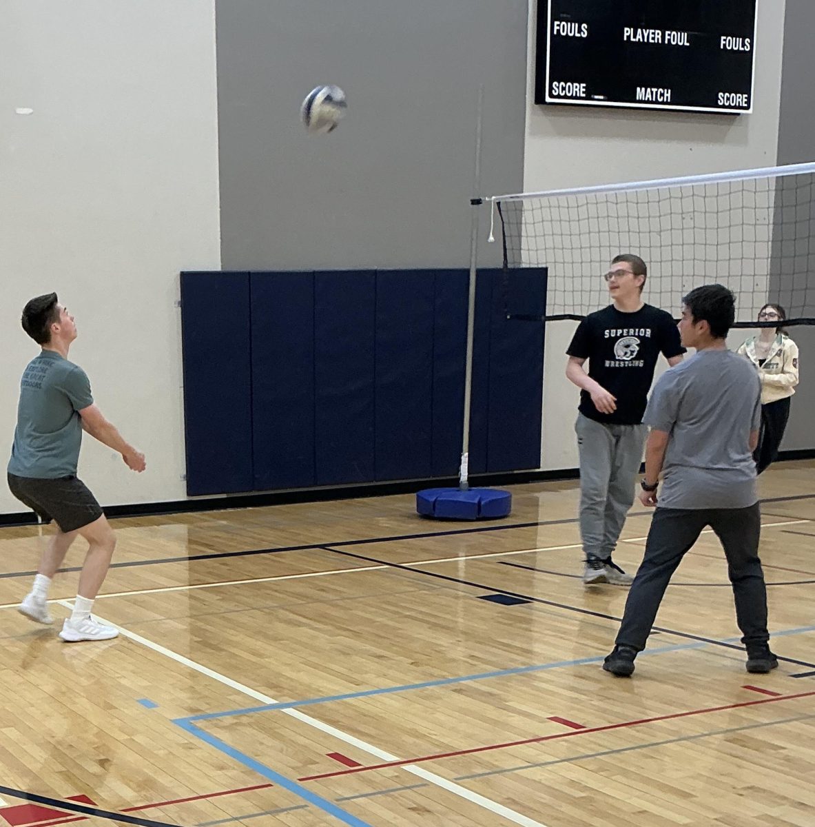 Junior Nathanael Payne (Left) prepares to return a serve on May 2. The volleyball unit in gym class is in its final day of the unit, the unit started on April 21.