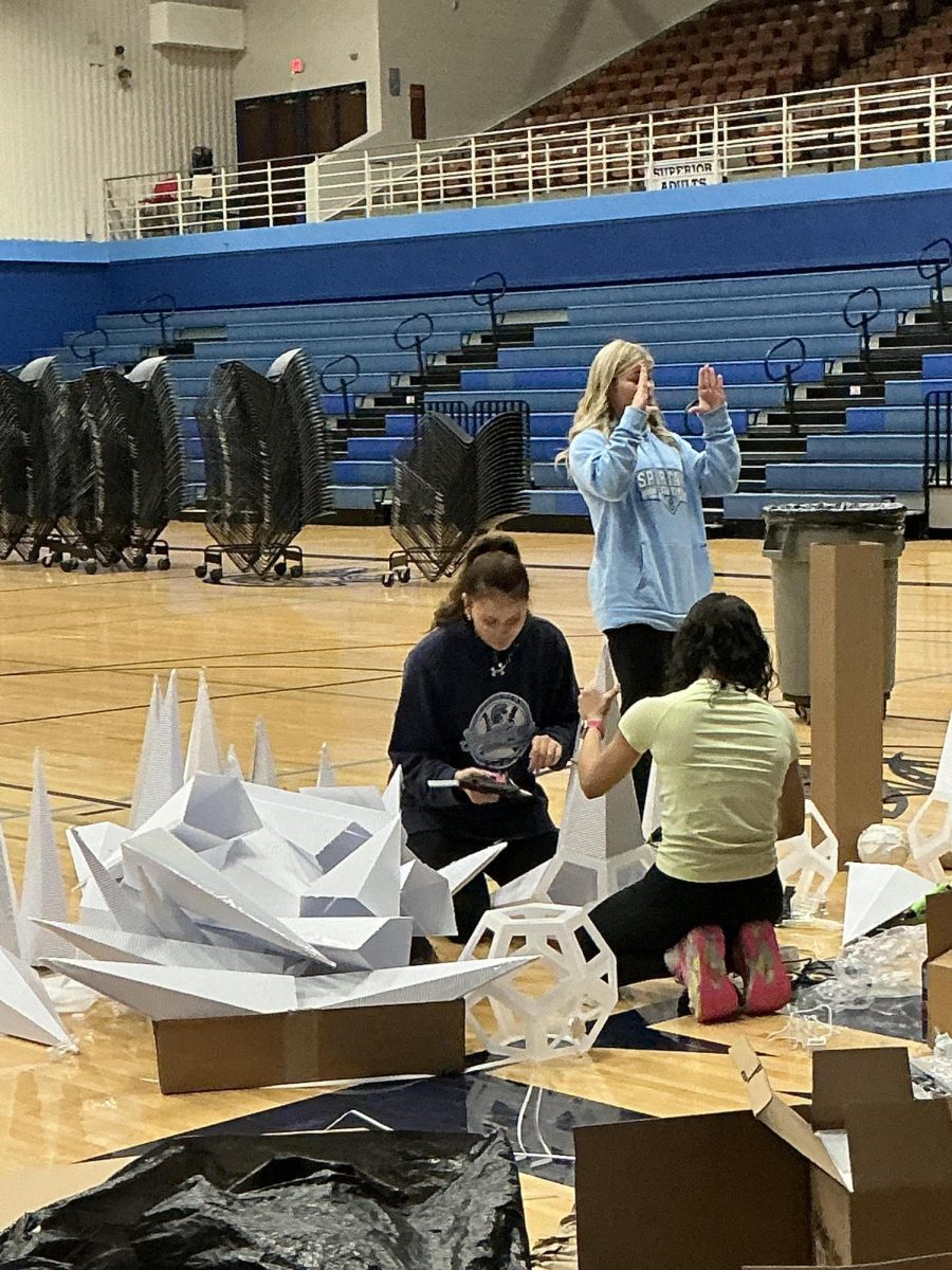 prom committee sets up for the grand march in main aux gym at shs  