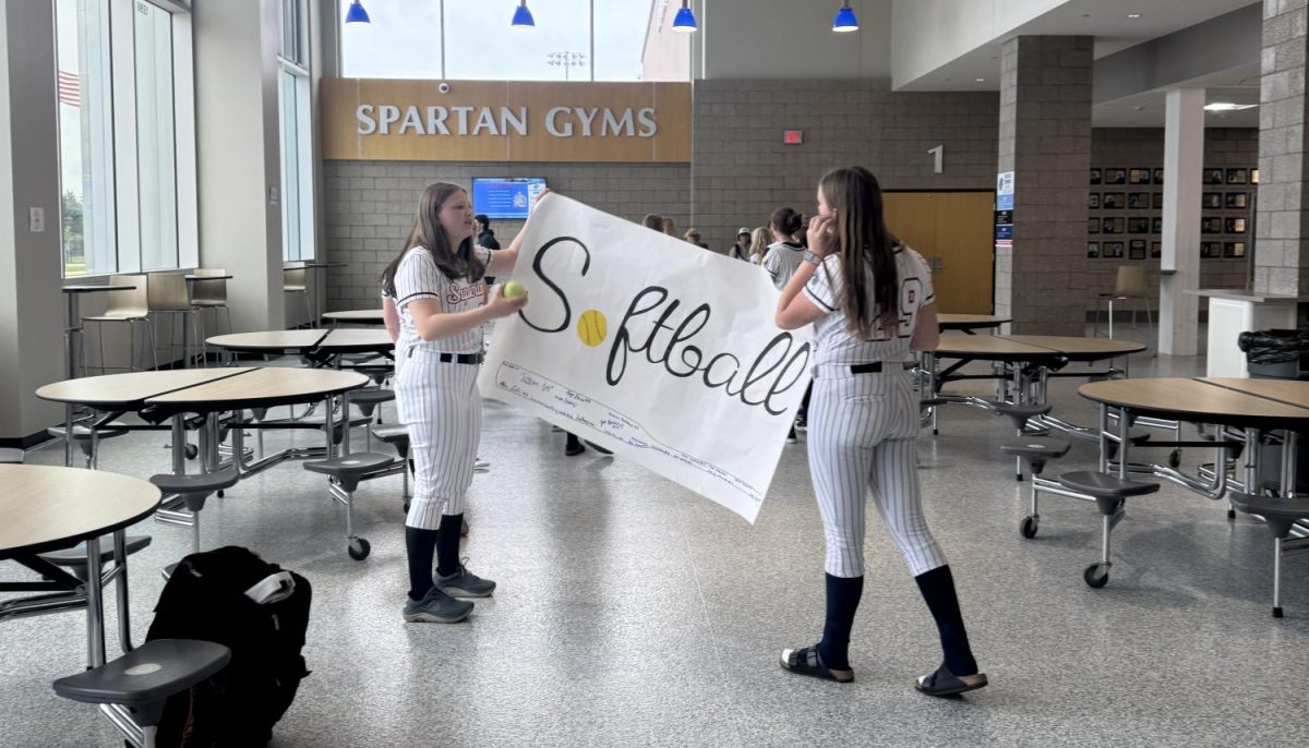 Softball meets in the commons with sign for the school Lip dub taken place on May 20, 2025. The lib dub is was designed uplift school spirit among all activities.
