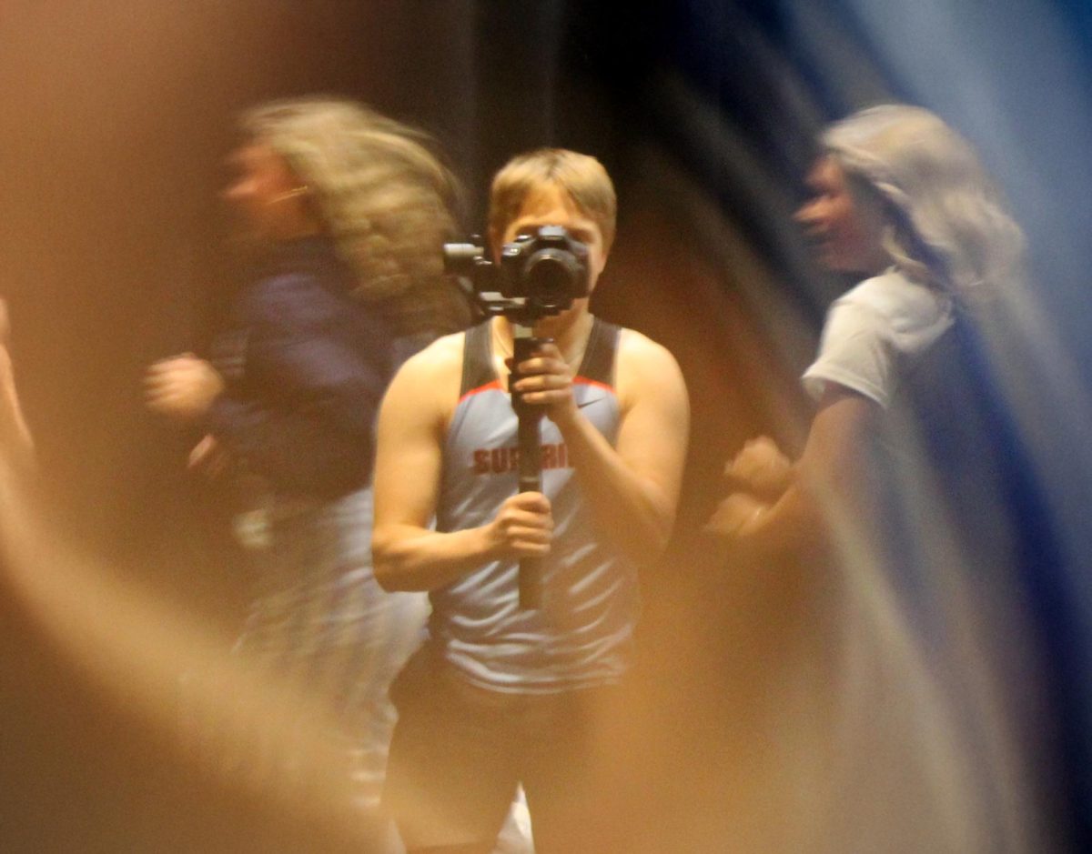 Brendan Farrell holds a gimbal stabilizer as he films the lip dub on May 21, 2025. The Lip Dub consists of many students lip syncing to a mashup of songs and is being released to YouTube on Friday, May 30.