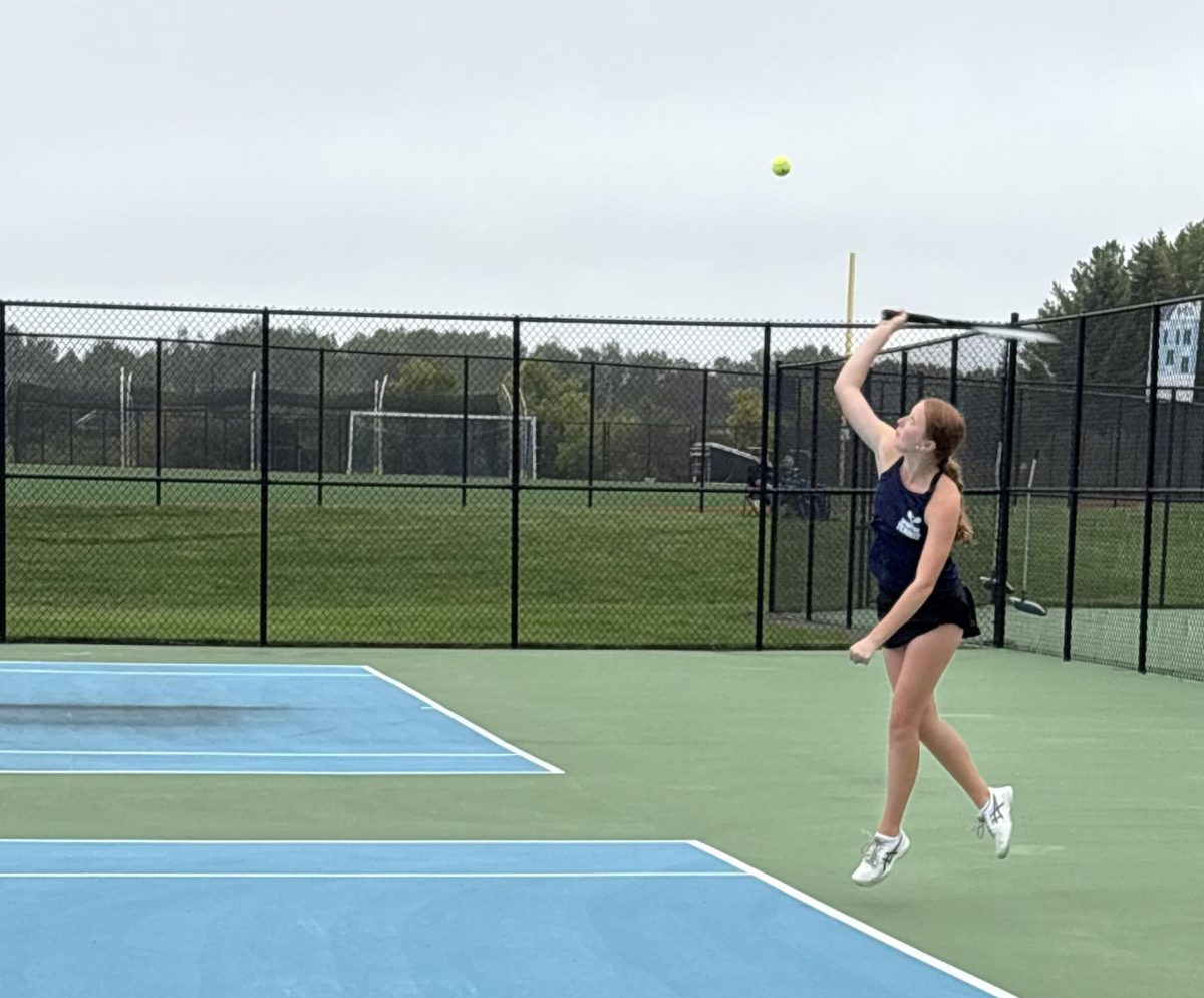 Senior Alexia Kimmes serves the ball during her match at No. 2 doubles on Sept. 22. She was one of two seniors celebrating their senior night against Cloquet.